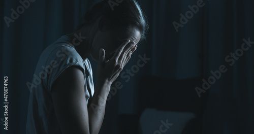 Obraz na płótnie Sad woman suffering from insomnia