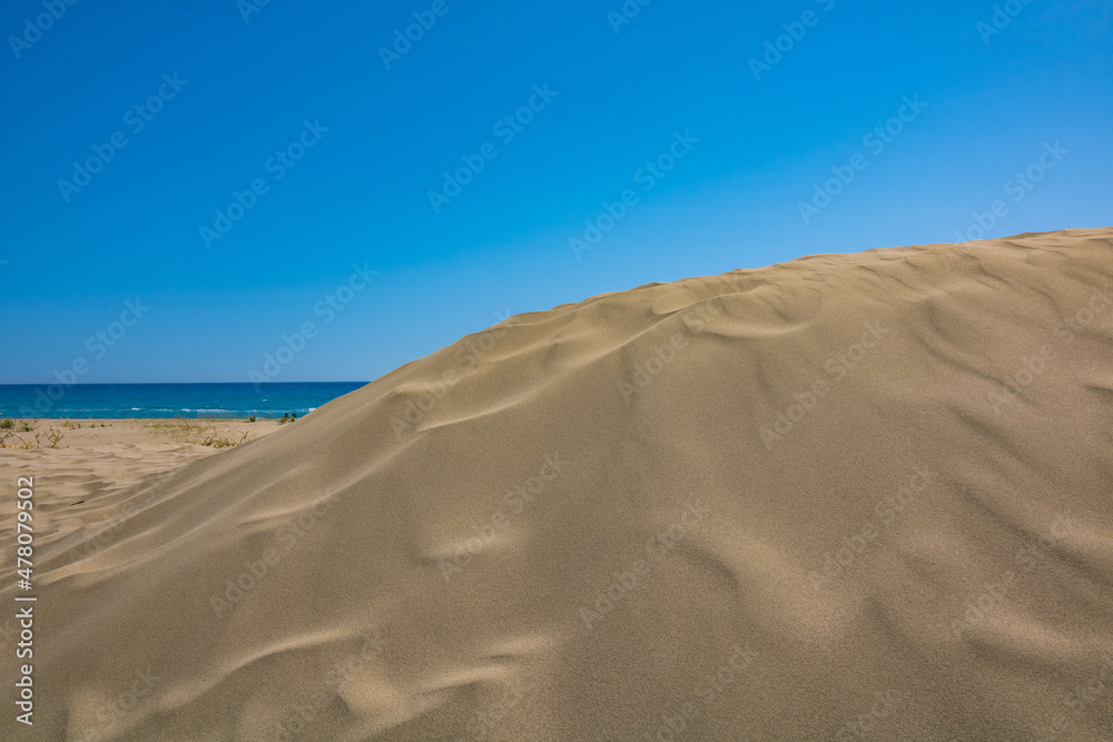 Beach. Dune in the beach with clear sky and sea on background