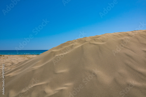 Beach. Dune in the beach with clear sky and sea on background