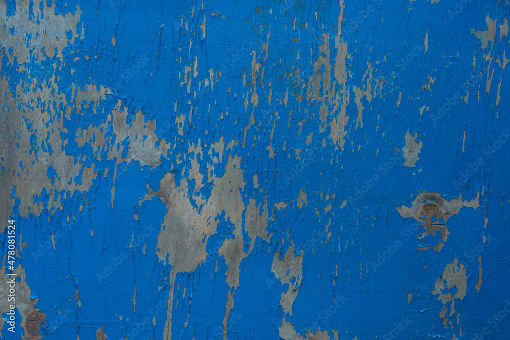 Fototapeta premium Wooden backdrop with copy space. Old blue painted wood texture surface with many scratches and scrapes as natural background.