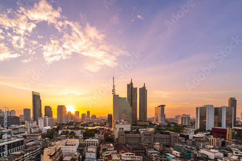 cityscape of Bangkok city skyline with sunset sky background, Bangkok city is modern metropolis of Thailand and favorite of tourists © lukyeee_nuttawut