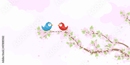Birds in love on blossom branches