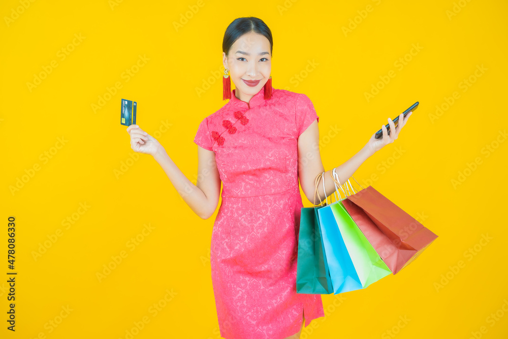 Portrait beautiful young asian woman smile with shopping bag Portrait beautiful young asian woman smile with shopping bag