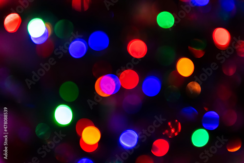 Multicolored christmas bokeh lights background