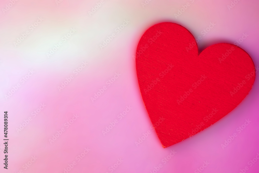 Red Heart with soft blurred pink background, Valentines Day concept, romantic greeting card Flat lay background with copy space
