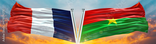 Foto France flag and Burkina Faso Flag waving with texture sky Cloud and sunset Doubl