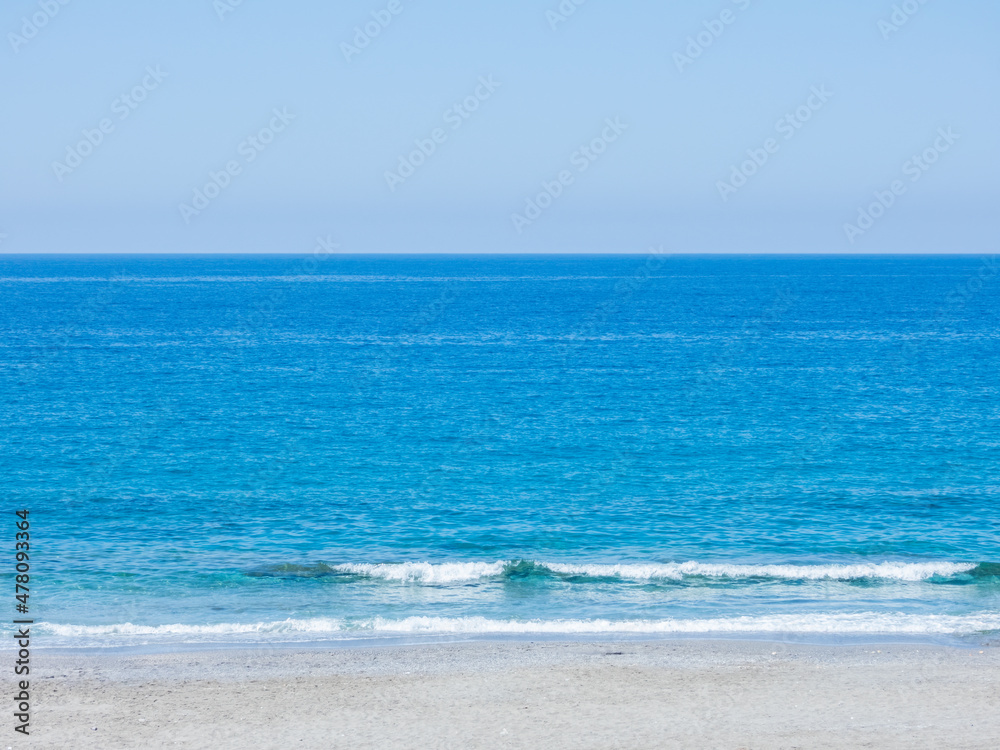 Mediterranean Sea with a fragment of the beach in calm weather Mediterranean Sea with a fragment of the beach in calm weather