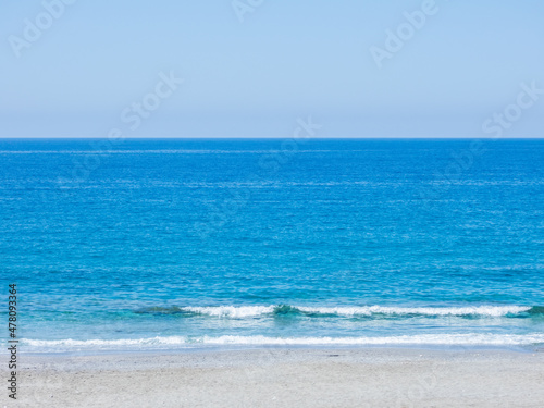 Mediterranean Sea with a fragment of the beach in calm weather