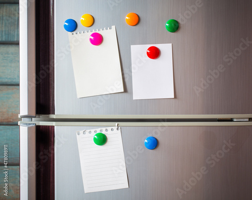 Empty paper sheet on refrigerator door. Note paper with color magnetic. Valentine send text love message.