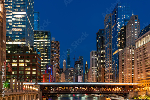 Illuminated night Panorama cityscape of Chicago downtown and River with bridges, Chicago, Illinois, USA. A vibrant business neighborhood © VideoFlow