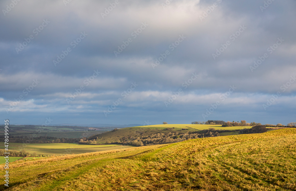 Wide expansive views from Chiselbury ring hillfort on Fovant Down Cranbourne Chase west Wiltshire south west England