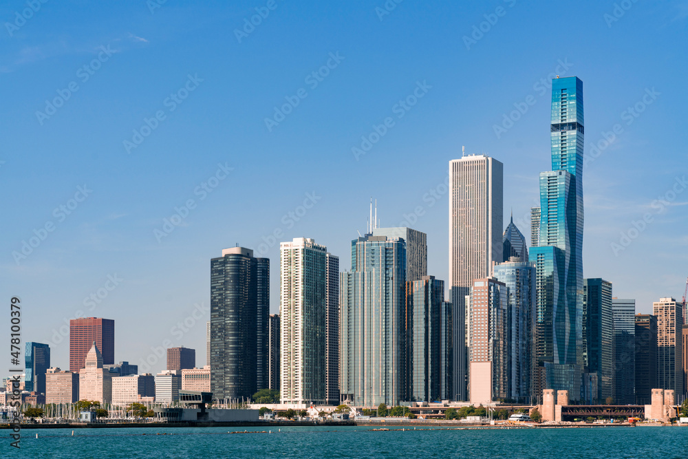 A picturesque view of Downtown skyscrapers of Chicago skyline panorama over Lake Michigan at morning time, Chicago, Illinois, USA