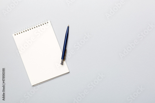 Blank notebook with pen on white background. Back to school and education concept