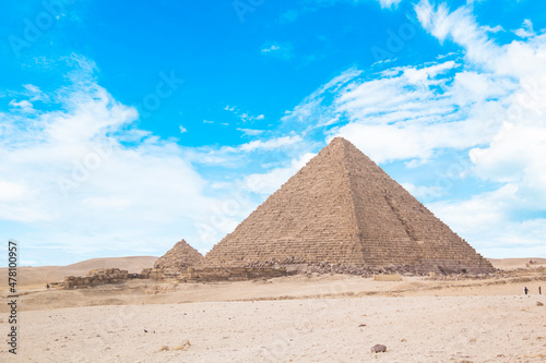 Great Sphinx against the background of the pyramids of the pharaohs Cheops  Khafren  and Mikerin in Giza  Egypt