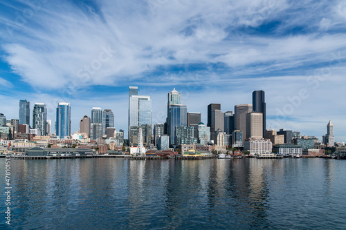 Waterfront Seattle skyline with Great wheel view. Skyscrapers of financial downtown at day time  Washington  USA. A vibrant business neighborhood