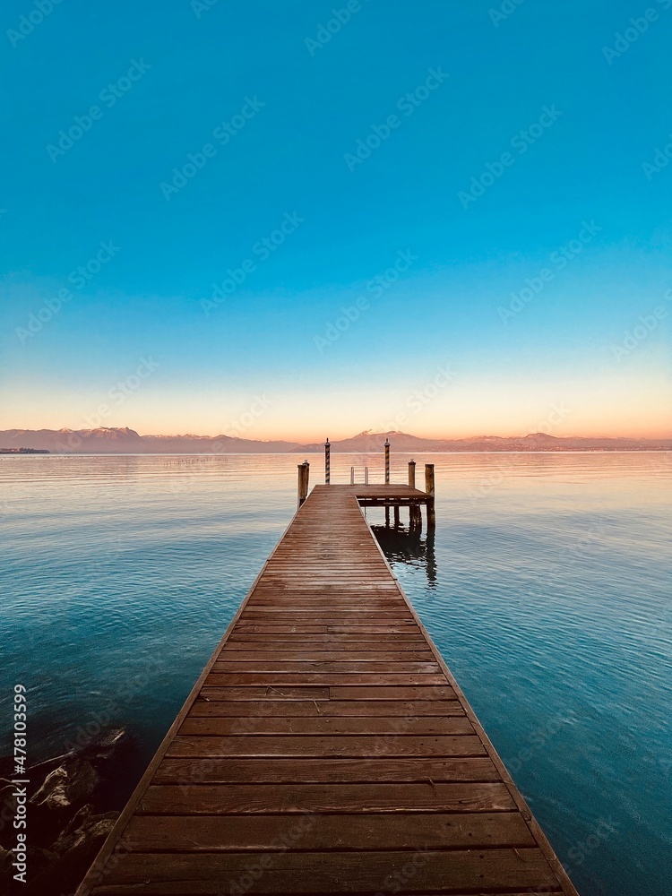 Wooden pier at sunset