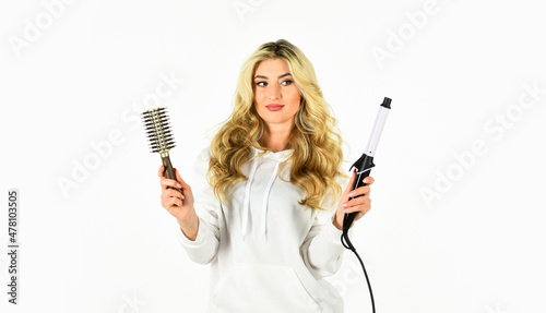 Choose right type curling iron for your needs. Create hairstyle. Woman with long curly hair use curling iron. Hairdresser tips. Girl adorable blonde. Online shop. Using different wrapping techniques