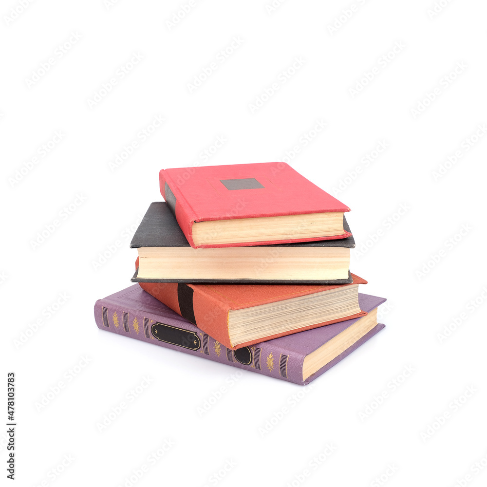 Stack of red black and purple books isolated on a white background Stack of red black and purple books isolated on a white background