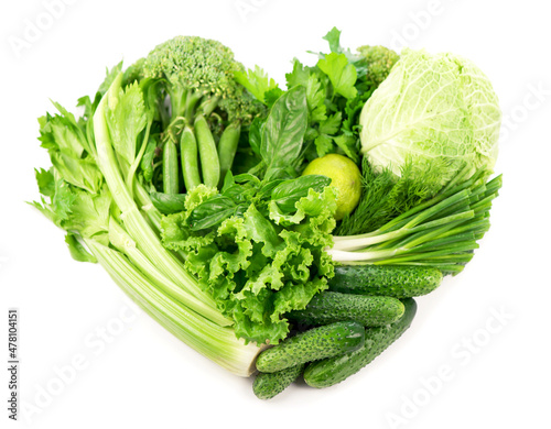 heart shape form by vegetables isolated on the white background.