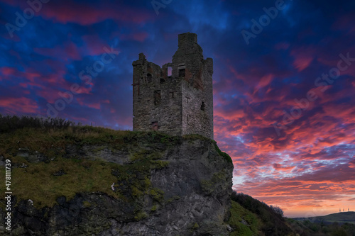 The Crumbling Ancient Ruins of Greenan Castle looking over From Greenan Bay in Ayrshire Scotland