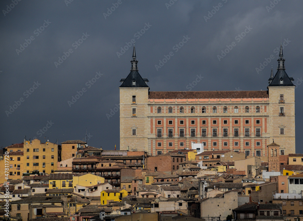 The town at the foot of the Alcazar of Toledo The town at the foot of the Alcazar of Toledo