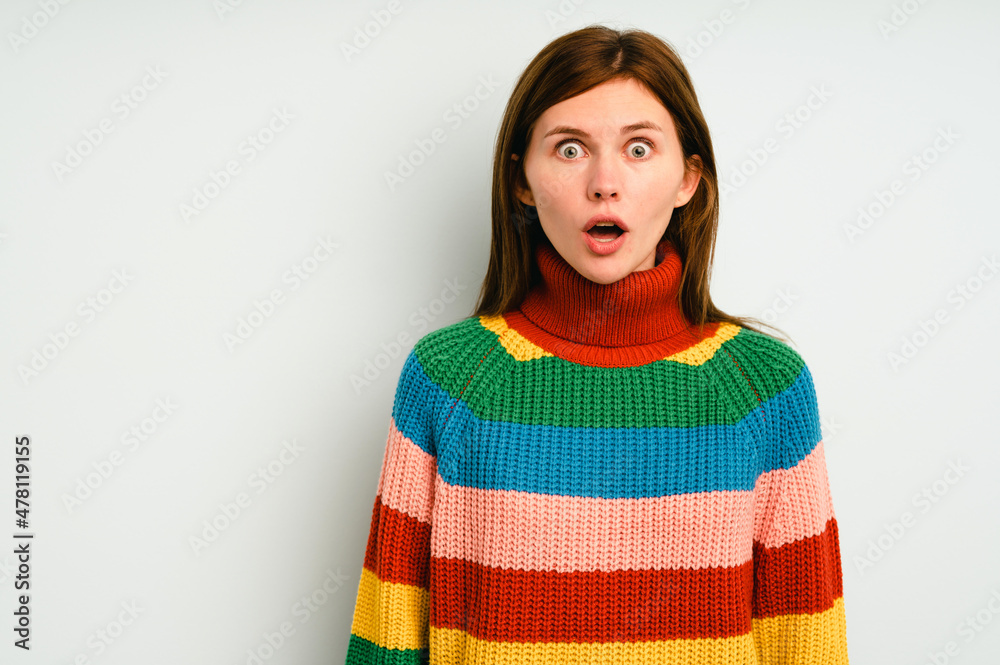 Young English woman isolated on yellow background Young English woman isolated on yellow background