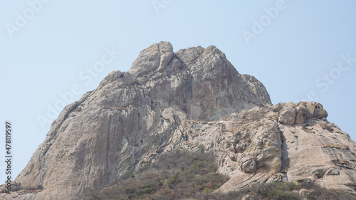 Peña de Bernal City and monolith rock formation in Querétaro state of central Mexico.