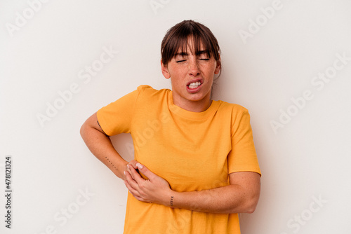 Foto Young Argentinian woman isolated on white background having a liver pain, stomach ache