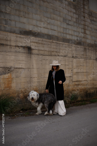 modern young girl with her bobtail dog
