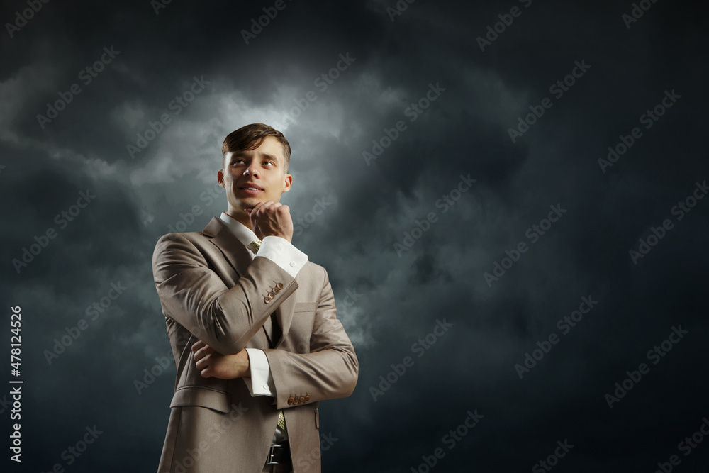 Thoughtful successful businessman . Mixed media Thoughtful successful businessman . Mixed media