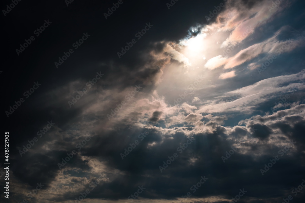 sun rays and clouds