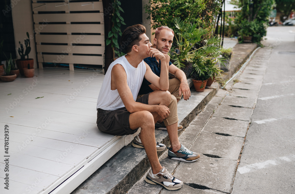 Gay Couple spend time together outdoors Gay Couple spend time together outdoors