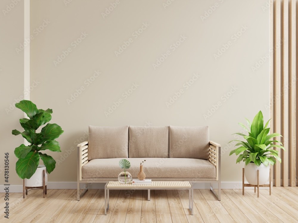 Mockup living room interior with sofa on empty cream color wall background.  Stock Illustration | Adobe Stock