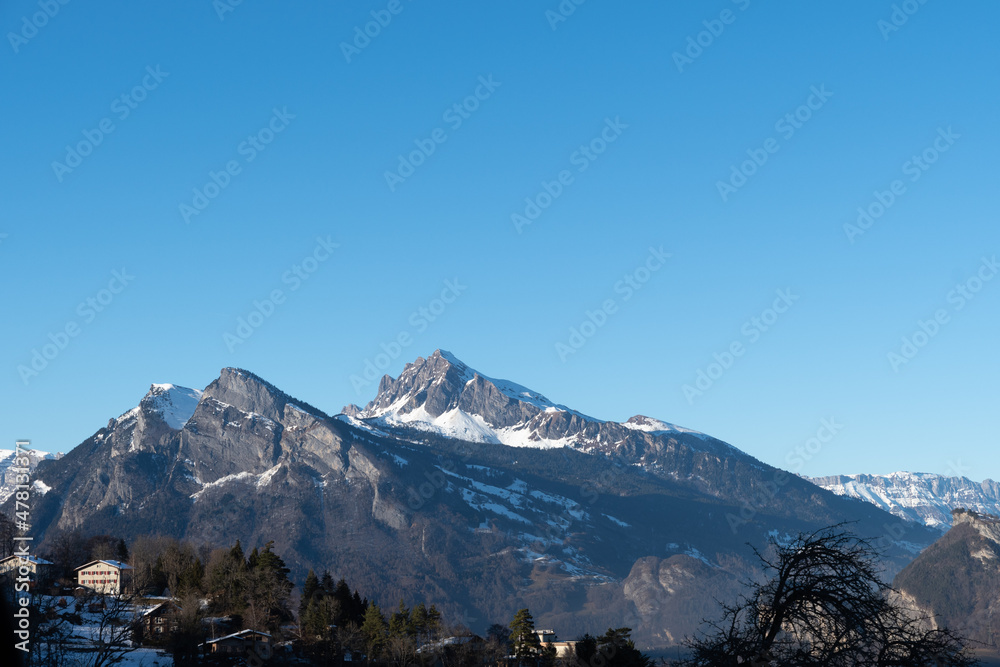 Fototapeta premium Landquart, Switzerland, December 19, 2021 Mountain scenery on a sunny day