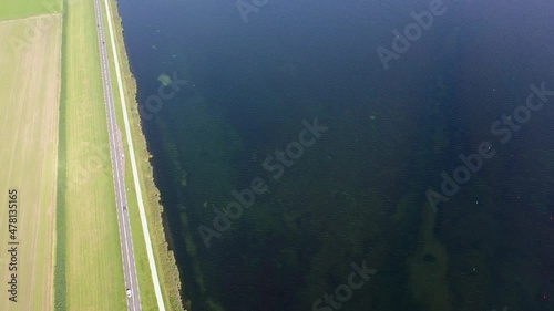 Drone video of the artificial tulip island called Tulpeiland in Wolderwijd off the coast of Zeewolde, peninsula in the shape of a tulip. The elongated natural islands form the trunk. Niederlands