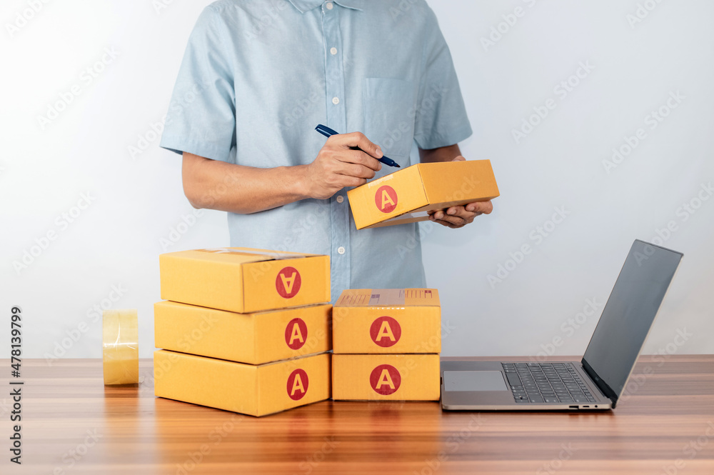 Man delivers goods to customers who order online. Man delivers goods to customers who order online.
