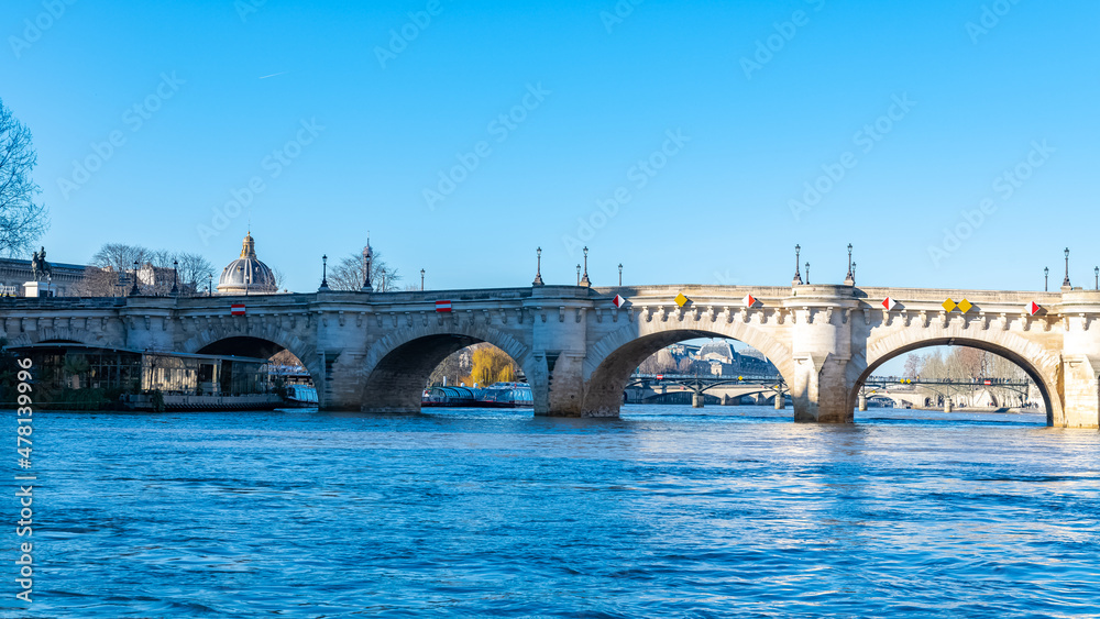 Paris, the Pont-Neuf on the Seine, typical panorama, with the dome of the Institut de France in background
