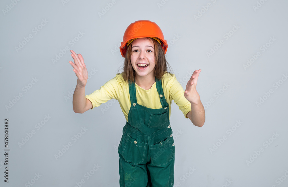 Build your future yourself. international workers day. electrician is her career. girl in helmet plays builder. building and renovating. kid build construction. engineer teen is construction worker Build your future yourself. international workers day. electrician is her career. girl in helmet plays builder. building and renovating. kid build construction. engineer teen is construction worker