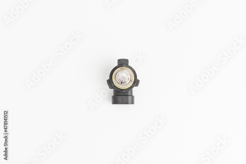Top view of Car headlight bulb halogen type on white background : auto parts concept
