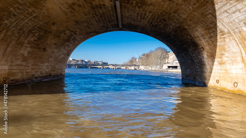 Paris, view of the Seine with the Pont des Arts in background, under the Pont-Neuf 