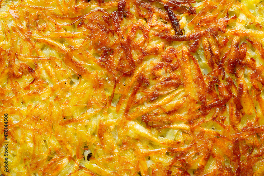 golden swiss rosti potato pancake food background