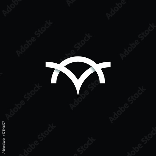monogram logo The letter MV or VM is in the shape of an owl's head, with a simple and modern style