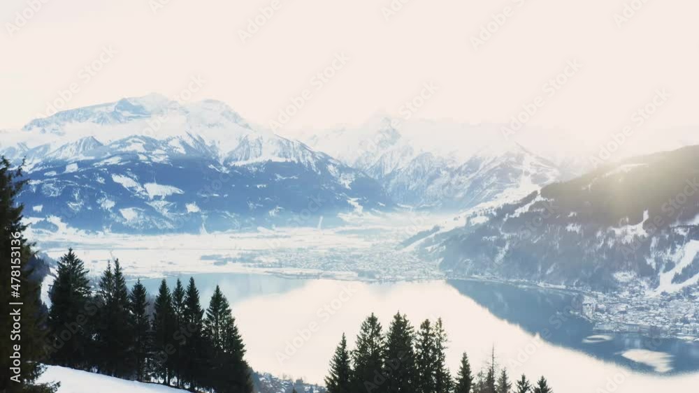 Amazing aerial view in the austrian snowy mountains at sunset. Amazing aerial view in the austrian snowy mountains at sunset.