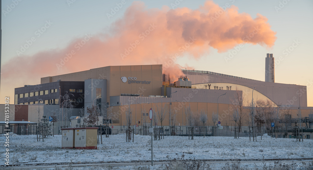 Modern waste incineration plant serving also as a district heating plant during a cold winter morning