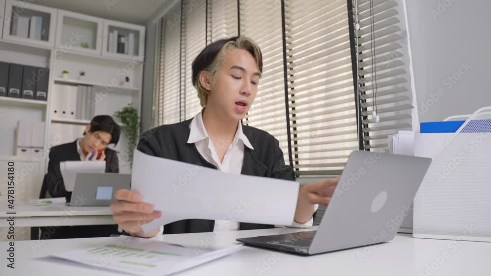 Asian handsome businessman gay people working in office with happiness Asian handsome businessman gay people working in office with happiness