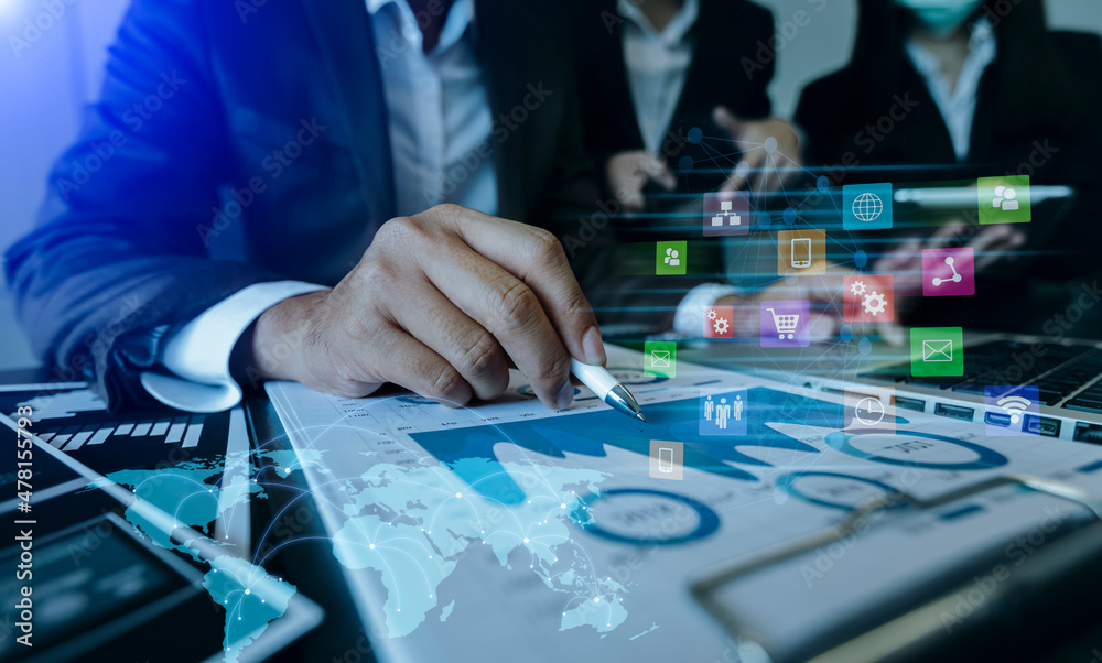 Business people hands working on network and digital finance marketing chart with future technology innovation and digital transformation concept.