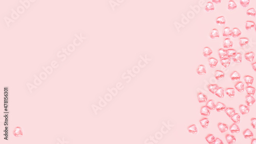 St Valentines day pink background border. Many glass hearts flat lay. Love or wedding concept © taniasv