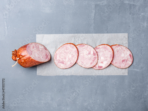 salami on a gray background