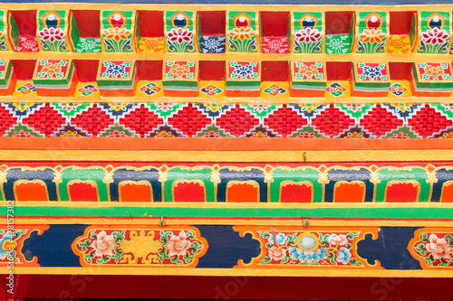 Buddhist thangka - a Tibetan Buddhist painting on cotton, or silk applique - in a monastery in Ralong, Sikkim, India photo