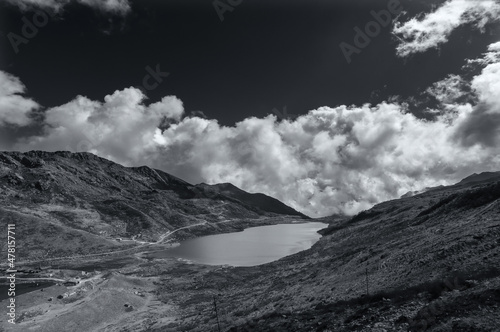 Elephant Lake, named due to it's shape as a lying elephant, remote high altitude lake at kupup Valley, Sikkim. Himalayan mountain range, Sikkim, India - black and white image